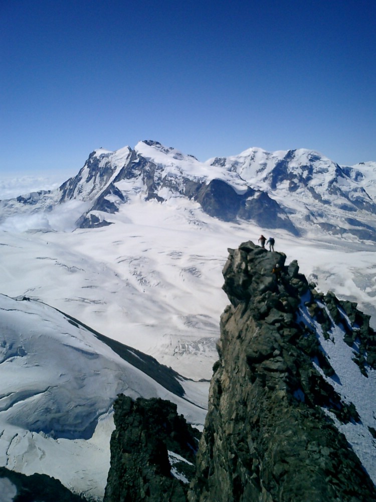 Alpine Climbing on Rimpfischhorn with Monte Rosa in the background.   Photo: Andreas Bengtsson