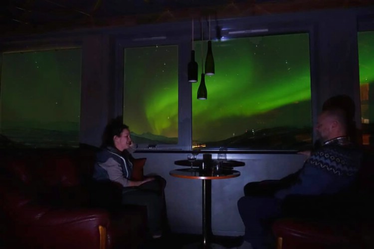 After a day of skiing it is great to sit in the bar and see northern lights outside the hotel. 