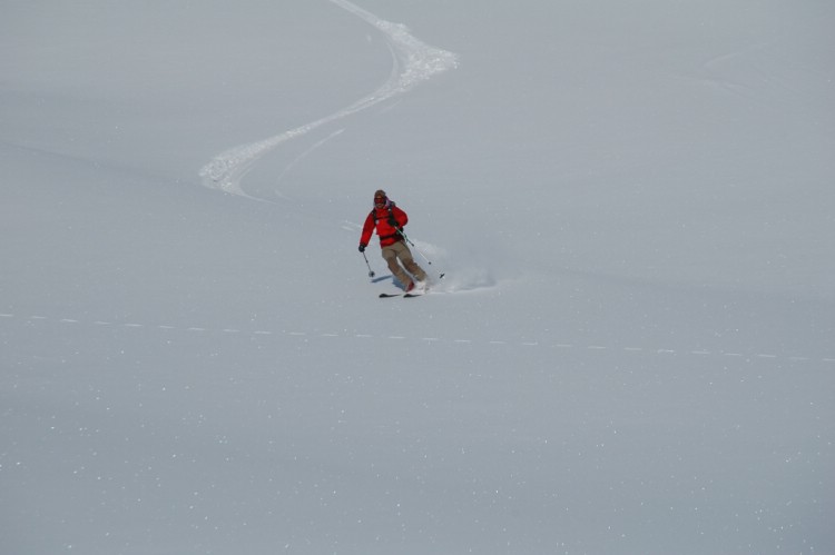Mountain Guide Andreas Bengtsson crossing the track from a Reindeer.     Photo: Peter Almer 