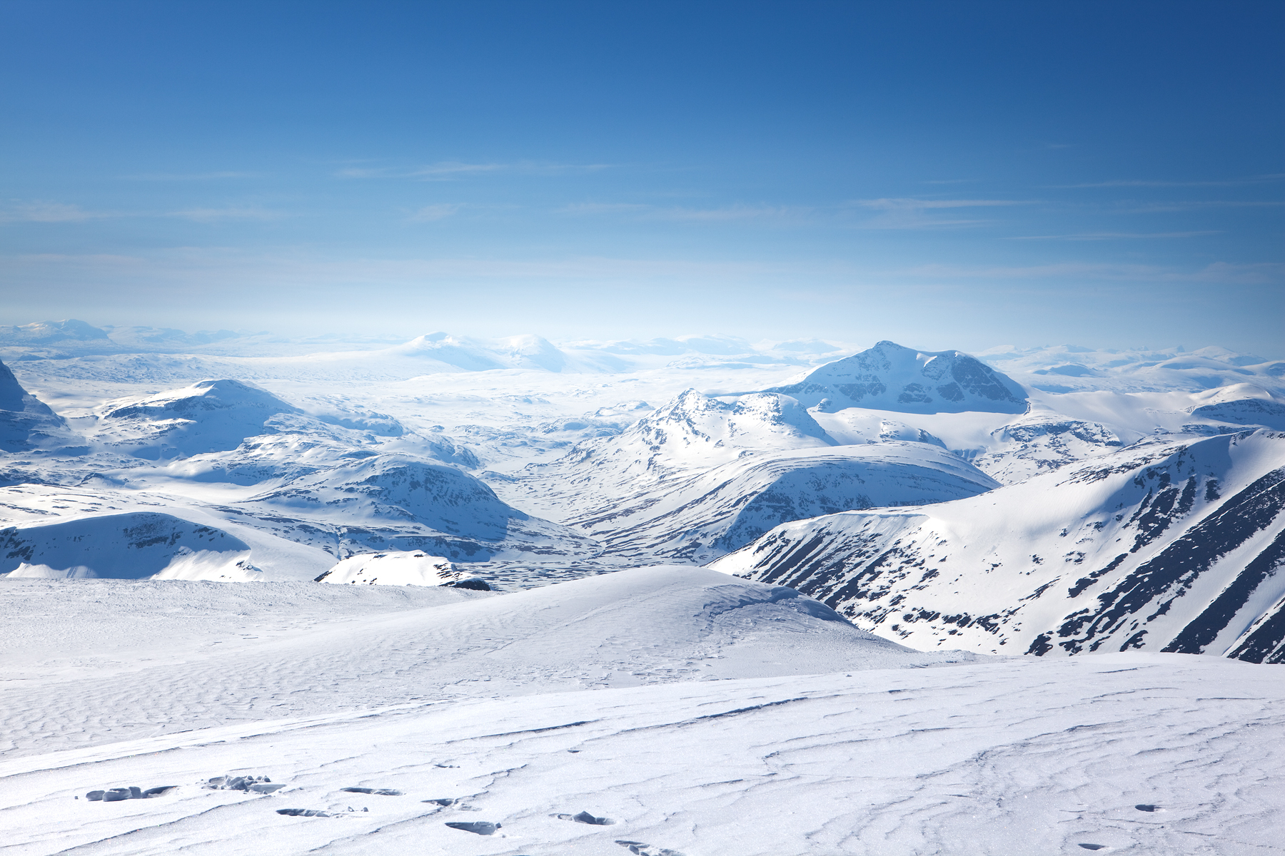 This picture from the summit of Kebnekaise mark the end of the season 2009. Thanks to all of you skiing with us. Hope to see you all next year. Photo: Henrik Bonnevier