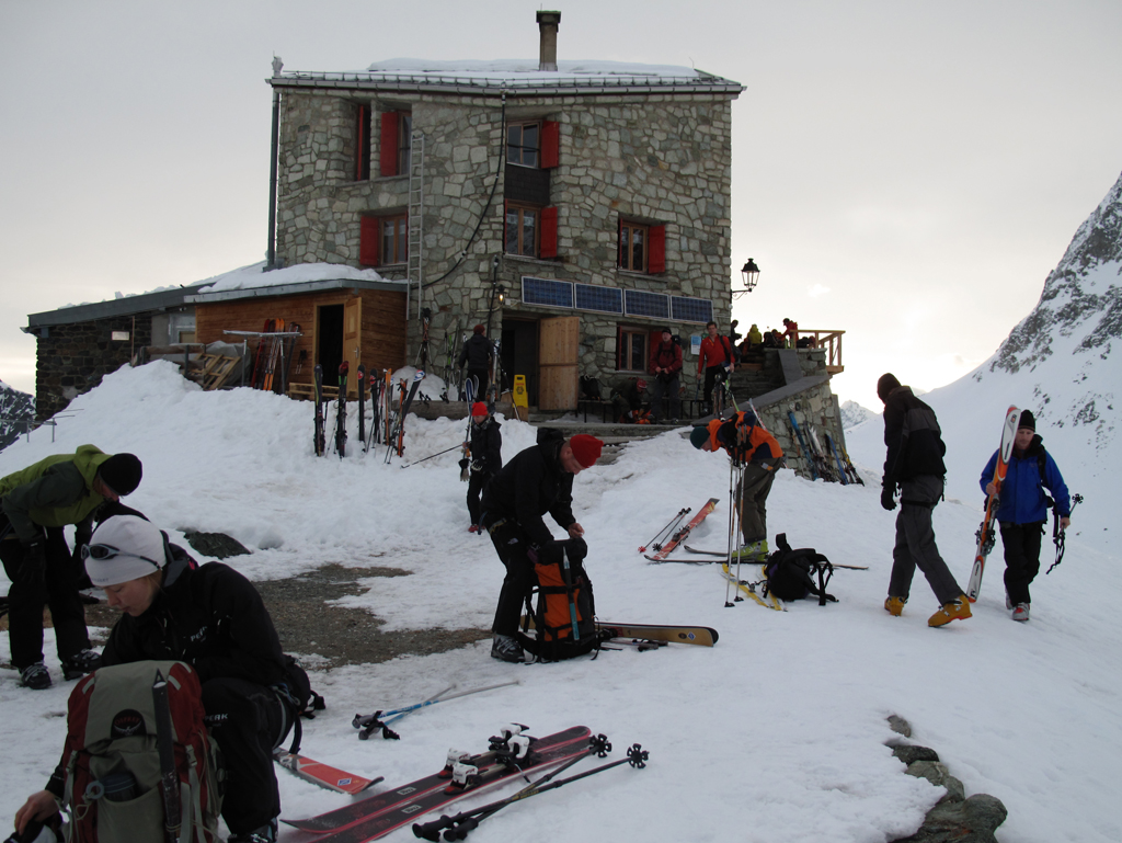 Morning preparations for the ski touring day ahead at the Dix Refuge. Photo: Lisa Auer