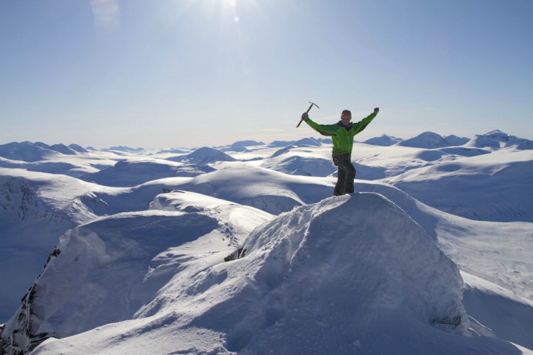 On the summit of Nilas Kamm. Skitouring in Sarek, Sweden 4th April 2010. Photo: Magnus Strand